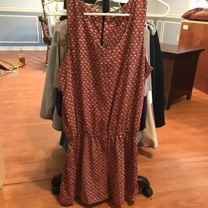 red patterned romper with pockets